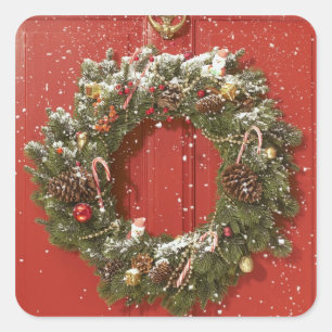 Christmas wreath hanging on a door square sticker