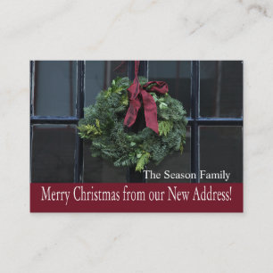 Christmas wreath on door new address enclosure card