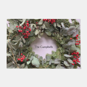 Christmas wreath with eucalyptus and red berries doormat