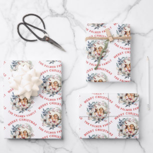 Christmas wreath with white flowers and photo wrapping paper sheet