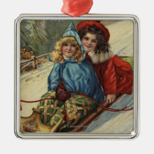 ChristmasTwo Little Girls Sledding Metal Ornament