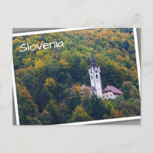 Church in a fall forest in Slovenia Postcard