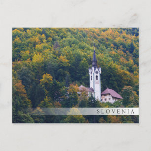 Church in a fall forest in Slovenia Postcard