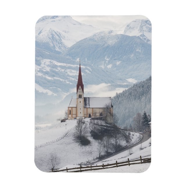 Church in an alpine winter landscape magnet (Vertical)