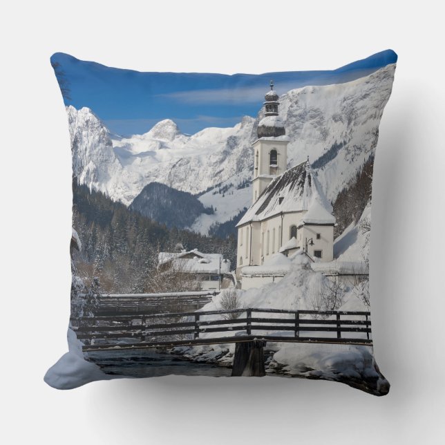Church in the snow with Alps mountains Cushion (Front)