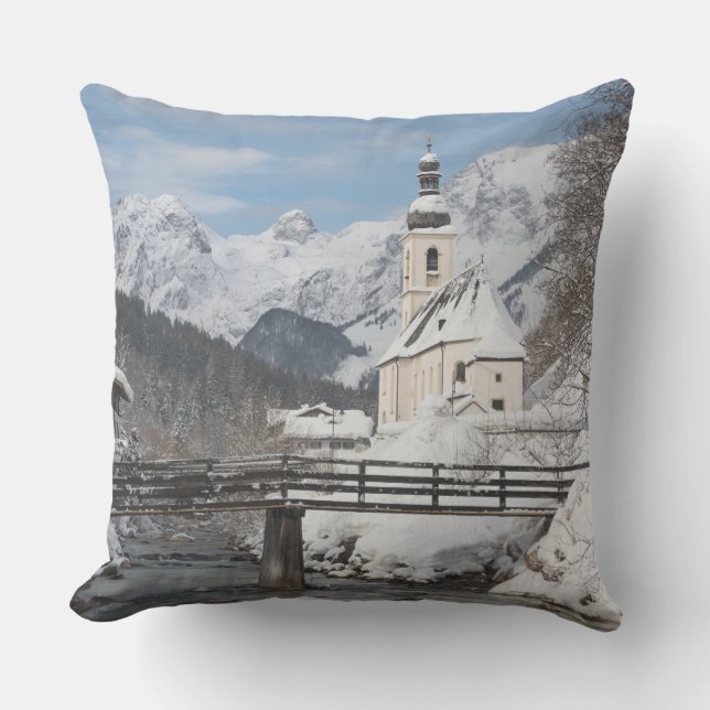Church in the snow with Alps mountains in winter Cushion (Front)