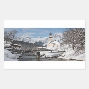 Church in the snow with Alps mountains in winter Rectangular Sticker