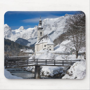 Church in the snow with Alps mountains Mouse Pad