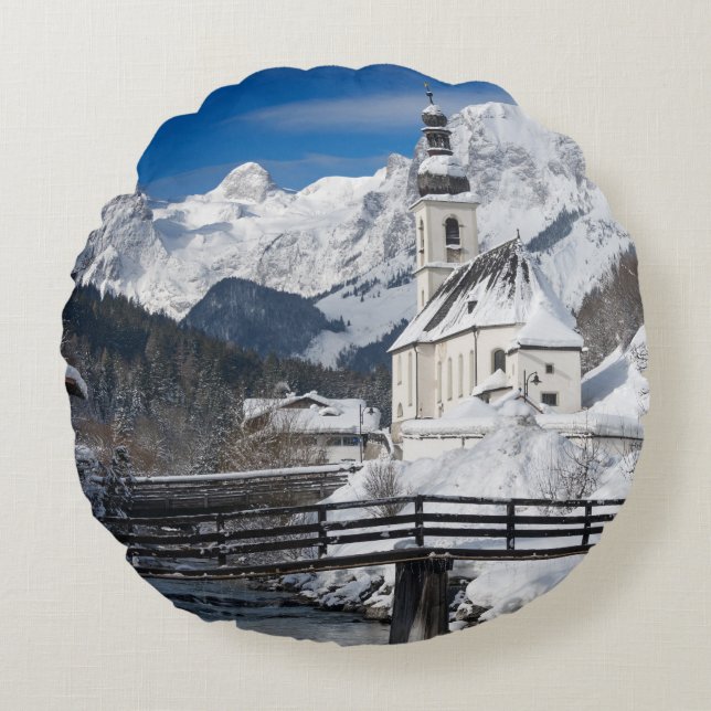 Church in the snow with Alps mountains Round Cushion (Front)