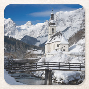 Church in the snow with Alps mountains Square Paper Coaster