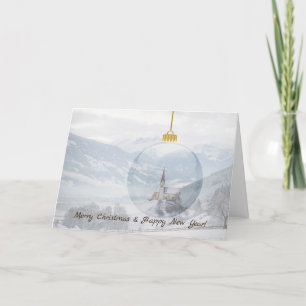 Church in winter in a glass ball christmas card