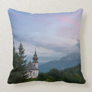 Church with Alps mountains at sunset Cushion