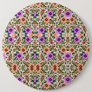 Circular pin badge with intricate floral pattern
