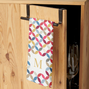 Circular quarter pattern red gold monogram tea towel