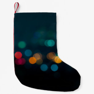 City night light blur bokeh, defocused backgrounda small christmas stocking