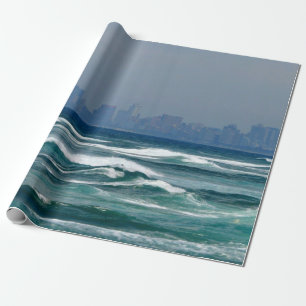 City Skyline behind the waves of the ocean Wrapping Paper