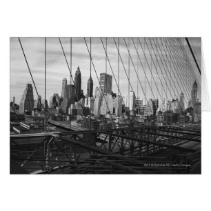 Cityscape through bridge cables