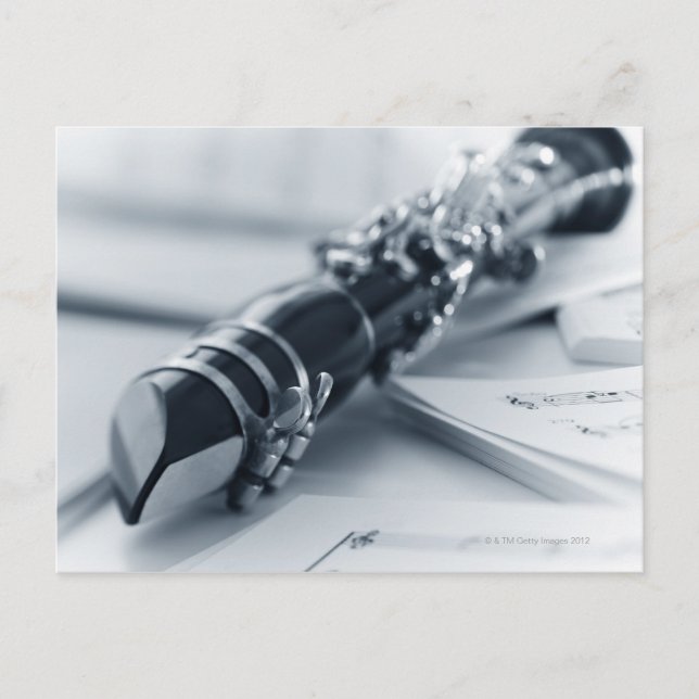 Clarinet on Music Sheets Postcard (Front)