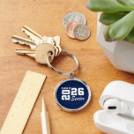 Class Of  Keychain<br><div class="desc">Grad class keychain is shown in a navy blue and white color design.
Text: Class of 2026.



Licensed</div>