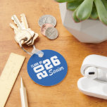 Class Of  Keychain<br><div class="desc">Grad class keychain is shown in a blue and white color design.
Text: Class of 2026.



Licensed</div>