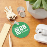 Class Of  Keychain<br><div class="desc">Grad class keychain is shown in a green and white color design.
Text: Class of 2026.



Licensed</div>