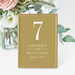 Classic Antique Gold Wedding Table Number Card<br><div class="desc">A rich antique gold background and bold white serif typography create a luxurious, formal wedding table number card. The couple's names and wedding date are displayed in an elegant typographic layout for a refined monogram centerpiece on every reception table. The couple's names, date, and table number are easy to personalise....</div>