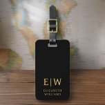 Classic Black Gold Minimalist Monogram Name Luggage Tag<br><div class="desc">Elevate your travel experience with our Classic Elegant Modern Minimalist Monogram Luggage Tag. This meticulously designed accessory seamlessly combines timeless elegance with contemporary minimalism, ensuring your luggage stands out with sophistication. Crafted with precision and attention to detail, this luggage tag is more than just a practical item; it's a personalised...</div>