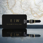 Classic Black Gold Minimalist Monogram Name Luggage Tag<br><div class="desc">Elevate your travel experience with our Classic Elegant Modern Minimalist Monogram Luggage Tag. This meticulously designed accessory seamlessly combines timeless elegance with contemporary minimalism, ensuring your luggage stands out with sophistication. Crafted with precision and attention to detail, this luggage tag is more than just a practical item; it's a personalised...</div>