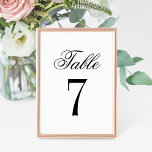 Classic Black White Wedding Table Number Card<br><div class="desc">A clean white background and bold black serif typography bring crisp, modern elegance to this wedding table number card. The couple's names and wedding date are displayed in a refined typographic layout for a polished monogram design. The couple's names, date, and table number are easy to personalise. Each table number...</div>
