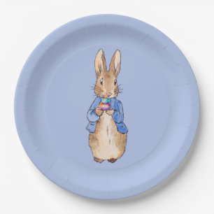 Classic bunny in blue holding a birthday cake paper plate