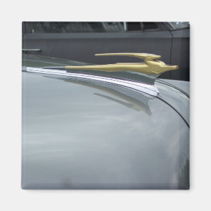 classic car golden hood ornament magnet