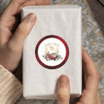 Classic Christmas Floral Crest Monogram Wedding Classic Round Sticker<br><div class="desc">Timeless and elegant yet festive holiday-themed wedding design featuring classic hand-drawn gold floral crest accented by a colourful spray of red and white Christmas flowers and evergreens. This custom formal template includes editable text fields as well as custom calligraphy text graphics and a gold textured border. The outside border features...</div>