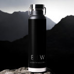 Classic Elegant Modern Minimalist Monogram Name Water Bottle<br><div class="desc">Elevate your hydration routine with our Classic Elegant Modern Minimalist Monogram Black Water Bottle. Meticulously designed, this water bottle seamlessly merges timeless sophistication with contemporary minimalism, making it a stylish and functional accessory for your daily life. Crafted with precision and attention to detail, this water bottle is more than just...</div>