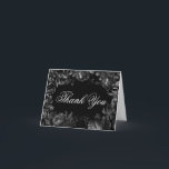 Classic Gothic Black Wedding Folded Thank You Card<br><div class="desc">Introducing the timeless allure of our Classic Gothic Black Wedding Folded Thank You Card design, where elegance meets the ethereal. An enchanting touch of dark romance adorned with intricate botanical motifs, featuring black backgrounds embellished with lush peonies and delicate roses that exude a moody sophistication perfect for your special day....</div>