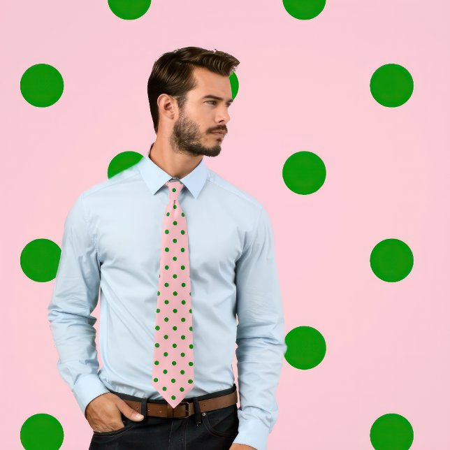 Classic Green Polka Dot Pattern on Pink Tie (Man wears a necktie with a green polka dot pattern on pink.)