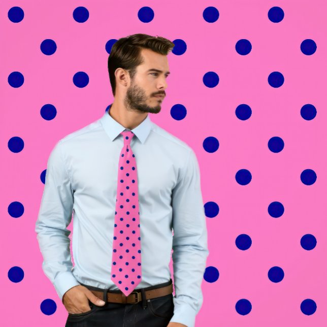 Classic Navy Polka Dots Pattern on Hot Pink Tie (Man wears a necktie with a classic pattern of navy blue polka dots on a hot pink background.)