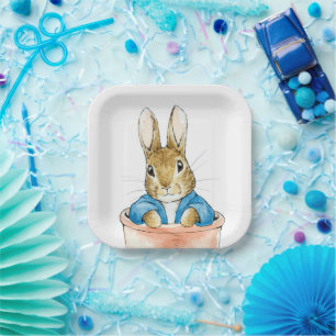 Classic rabbit sitting in plant pot paper plate