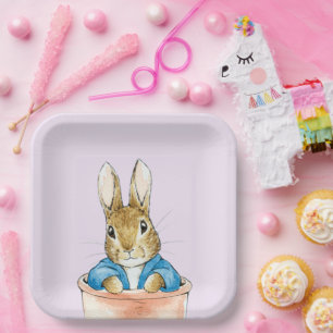 Classic rabbit sitting in plant pot paper plate