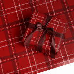Classic red holiday plaid wrapping paper<br><div class="desc">A bold modern take on a classic holiday plaid makes this wrapping paper set perfect way for both traditional and unconventional gift givers. The festive red background with the black and white checks is chic and stylish. Will look fantastic on all your gifts under the tree perfectly coordinated with your...</div>