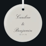 Classic Script Elegant Ivory Wedding Custom  Glass Tree Decoration<br><div class="desc">Celebrate timeless elegance with this classic script ivory wedding glass ornament. Featuring a sophisticated ivory backdrop and beautifully crafted script, this ornament exudes charm and grace. It's the perfect way to commemorate your special day, offering a subtle yet elegant addition to your holiday decor. Whether hung on your tree or...</div>