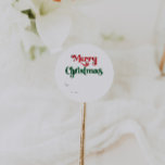 Classic Simple Merry Christmas Gift Classic Round Sticker<br><div class="desc">Celebrate the season with this unique, classic simple Merry Christmas gift classic round sticker featuring a touch of vintage charm. The minimalist design showcases an elegant red and green colour palette, evoking the cosy spirit of winter. Its modern and fun appeal, paired with the traditional wording, creates a perfect balance...</div>