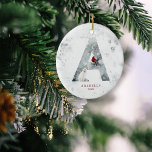 Classic Snowy Christmas Winter Scene Monogram A Ceramic Ornament<br><div class="desc">A magical Christmas winter scene complete with an artic wolf and red cardinal adorning the monogram letter A.  Easily change your personal data  and make this the perfect gift and keepsake for friends and family this holiday season</div>