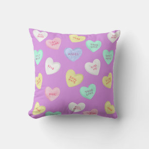 Classic Valentine's Candy Hearts on Purple Cushion