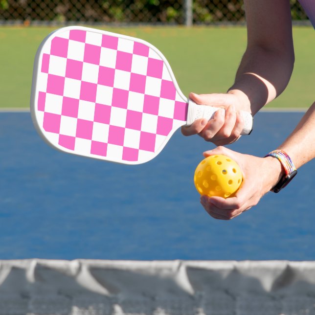 Classic visual pink checkerboard  pickleball paddle (Insitu)