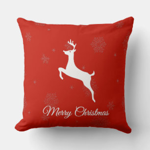 Classic White reindeer and Merry Christmas On Red Cushion