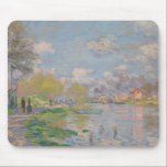 Claude Monet - Spring by the Seine Mouse Pad<br><div class="desc">Spring by the Seine by Claude Monet, 1875. Claude Monet was a founder of French Impressionist painting, and the most consistent and prolific practitioner of the movement's philosophy of expressing one's perceptions before nature, especially as applied to plein-air landscape painting. The term "Impressionism" is derived from the title of his...</div>