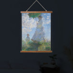 Claude Monet Wall Art Woman With A Parasol<br><div class="desc">Claude Monet,  Woman With A Parasol,  1800s. Old famous painting with a girl on a white dress holding a green umbrella on a garden or hill in an impressionist style. Printed on a wood-framed wall-hanging tapestry. CCO license,  public domain art.</div>