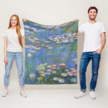 Claude Monet // Water Lilies Fleece Blanket<br><div class="desc">Water Lilies is a series of approxiamately 250 oil paintings by French Impressionist Claude Monet (1840-1926). The paintings depict Monet's flower garden at Giverny and were the main focus of Monet's artistic production during the last thirty years of his life. This reproduction is high resolution and true to the original...</div>