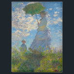 Claude Monet Woman with a Parasol Magnet<br><div class="desc">Add Impressionist beauty to your everyday view. This rectangular magnet features Claude Monet’s Woman with a Parasol, painted in airy blues, soft whites, and fresh greens. The graceful mother-and-child scene, captured in luminous brushstrokes, brings timeless charm to refrigerators, lockers, or office boards. Lightweight yet durable, it’s both decorative and practical—perfect...</div>