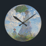 Claude Monet | Woman with a Parasol Round Clock<br><div class="desc">Woman with a Parasol - Madame Monet and Her Son,  1875 (oil on canvas)| by  Claude Monet | Art Location: National Gallery of Art Washington DC| French Artist | Image Collection Number: XOS741899</div>